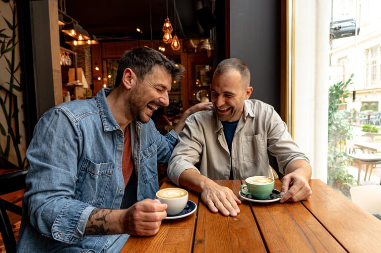 Men enjoying fellowship together over coffee