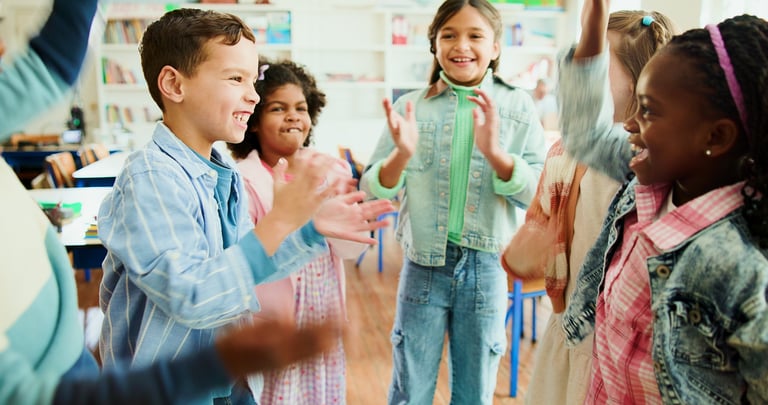 Children excited and learning together in classroom